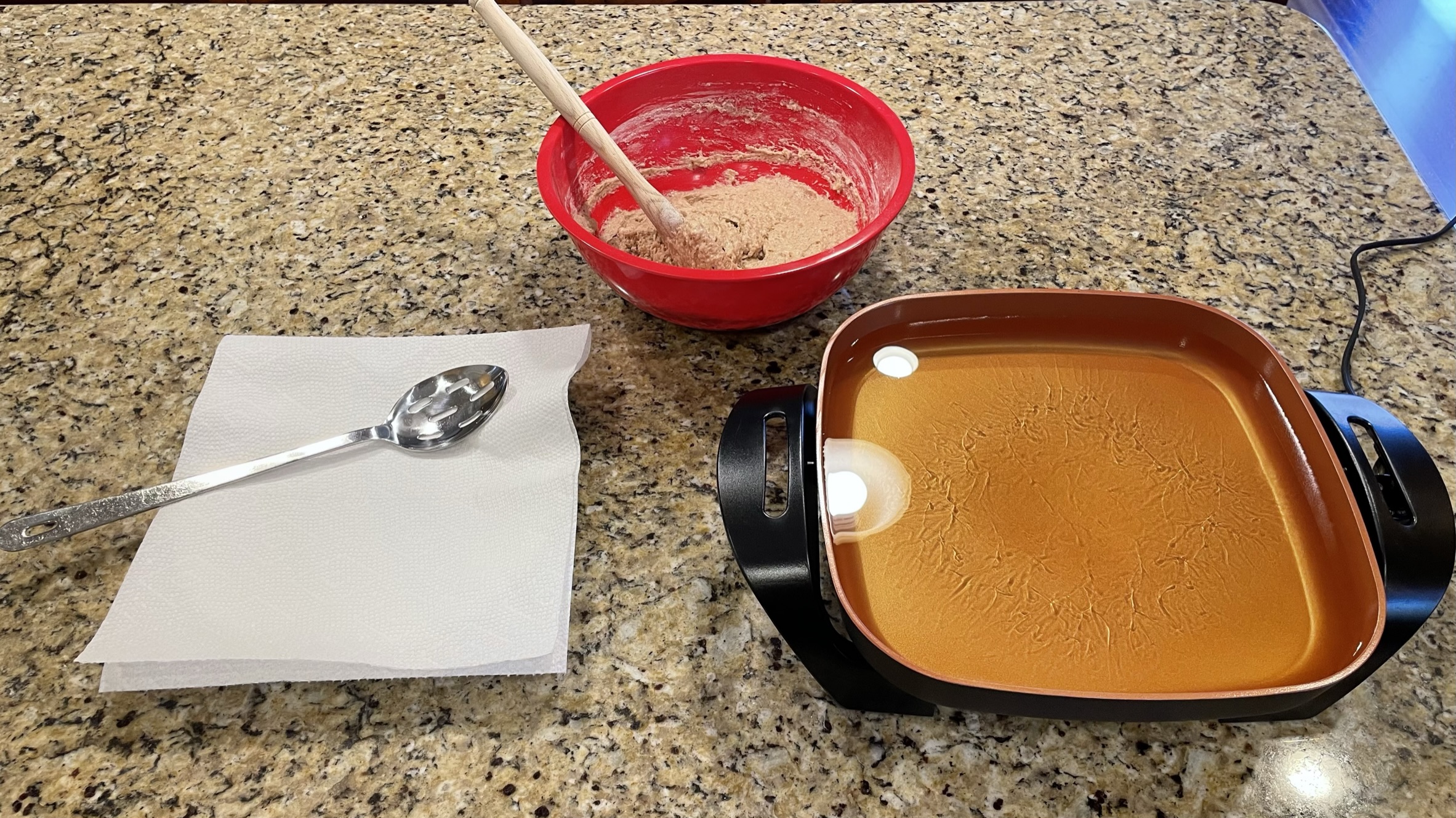 Apple Cinnamon Sinkers batter and hot oil, ready for cooking