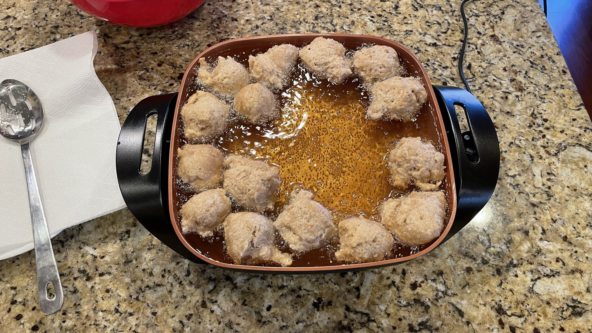 Apple Cinnamon Sinkers batter sizzling in hot oil