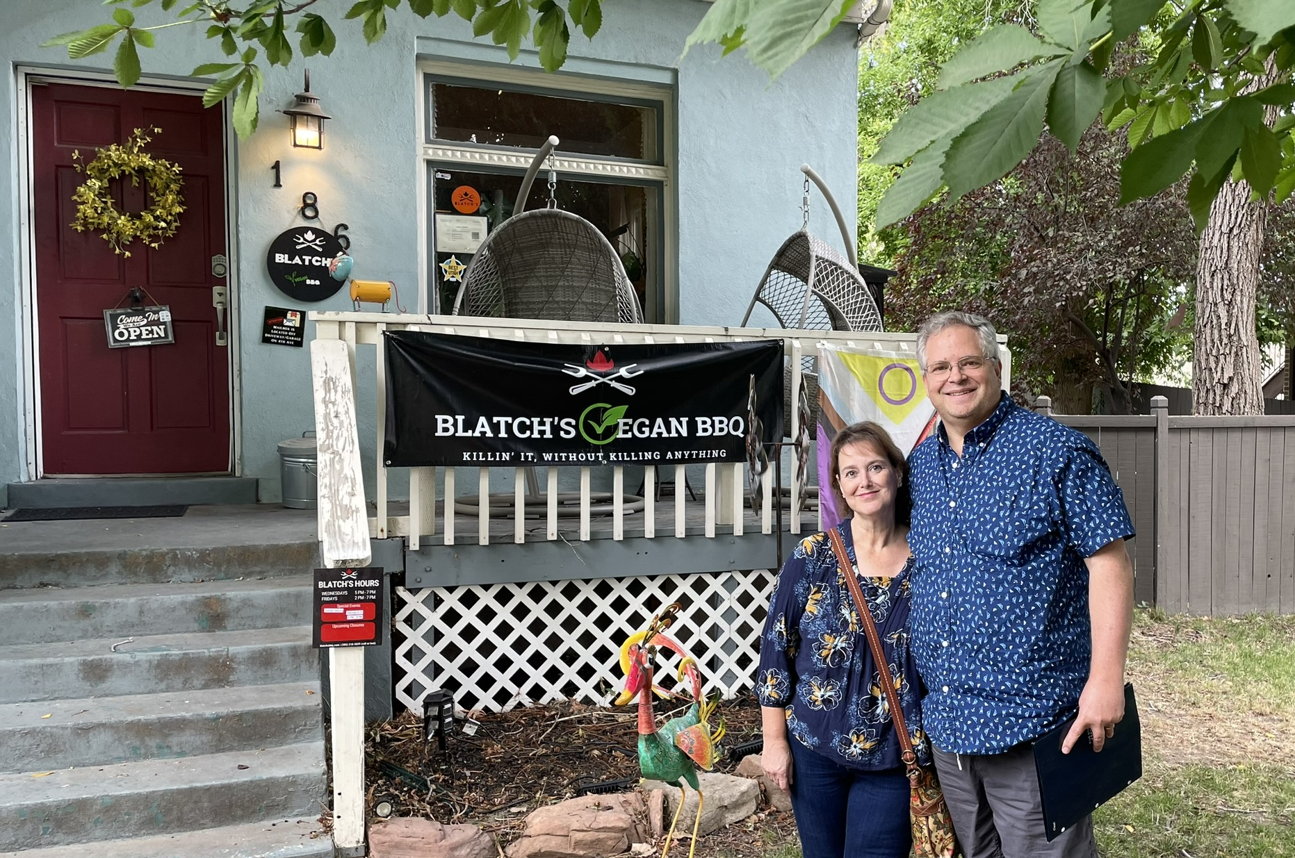 Brian T. and Kathy Hill at the entrance of Blatch's Vegan BBQ