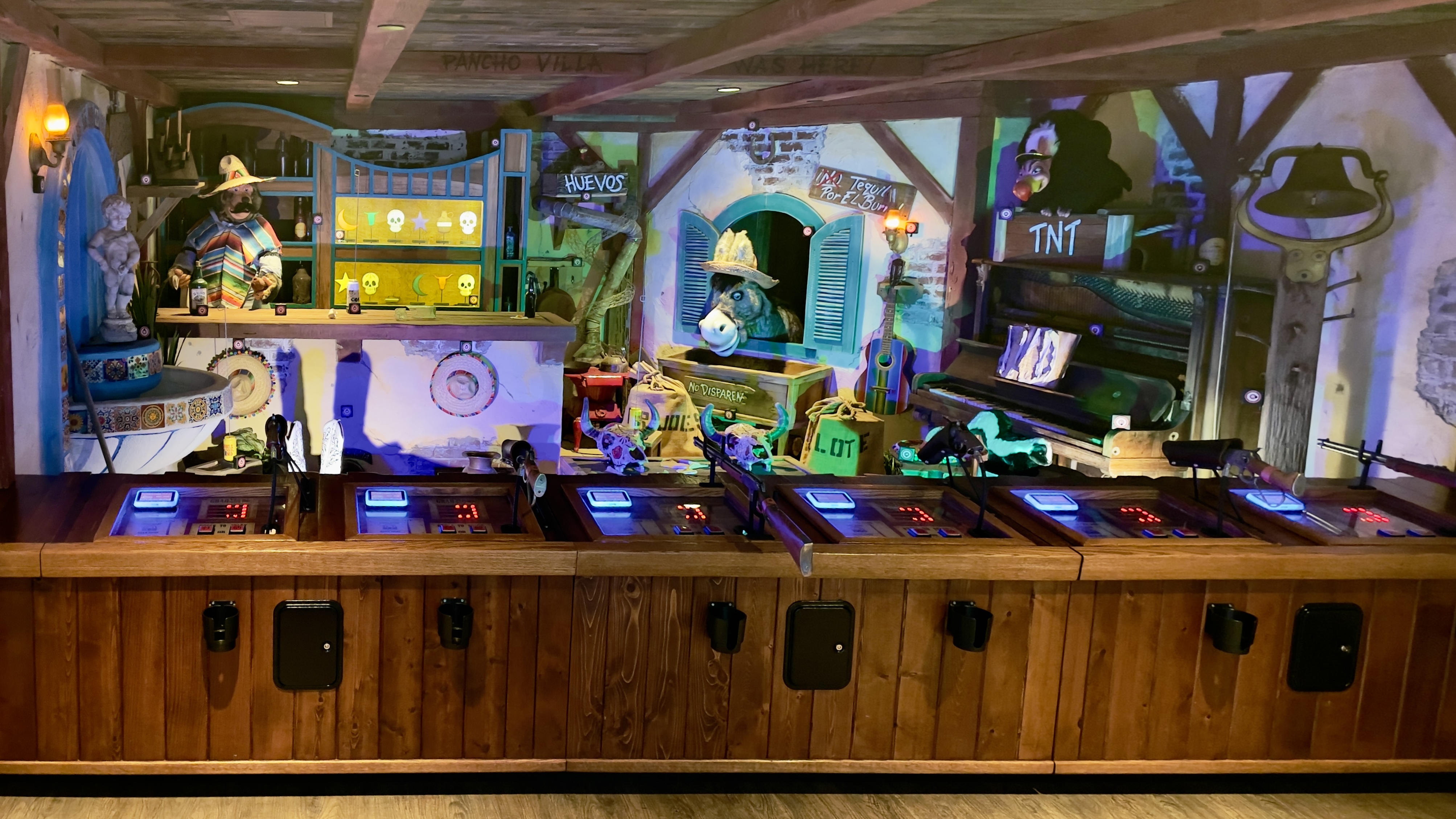 An old-timey shooting gallery at Casa Bonita.