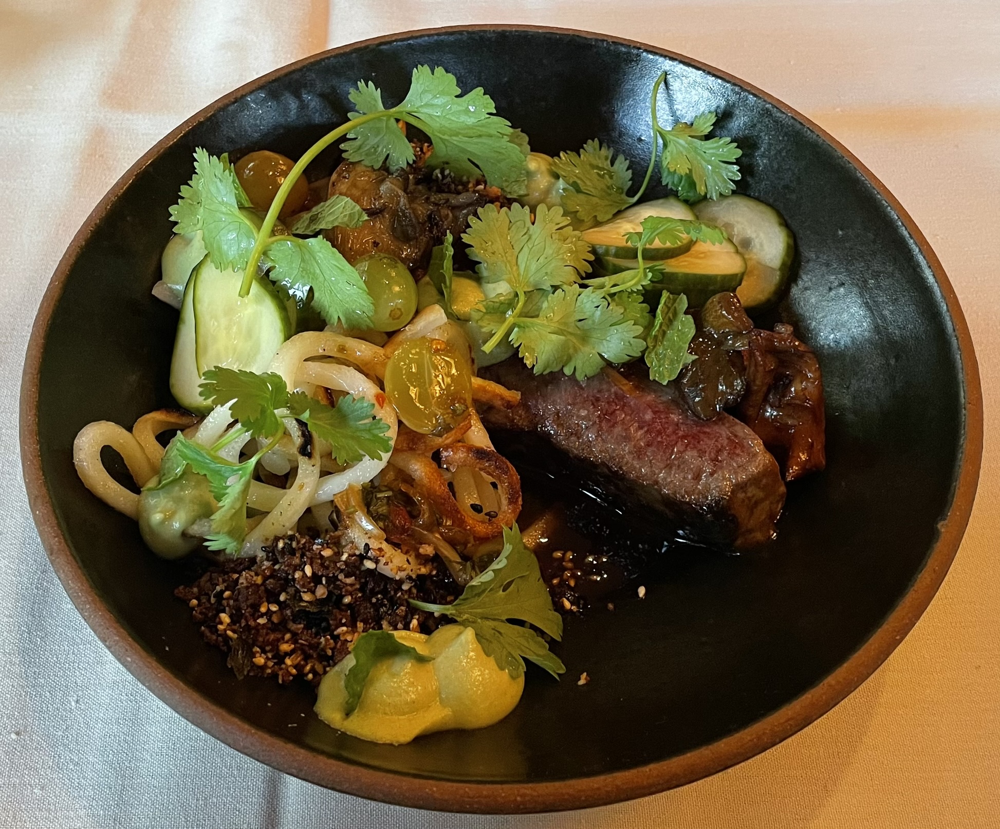 Ranger Valley Wagyu Beef Coulotte at Franck's Restaurant.  Wagyu fat Wasatch mushrooms, pan fried udon, grape jeow som, black vinegar jus, wasabi, furikake, nuoc cham Frogbench cucumber.