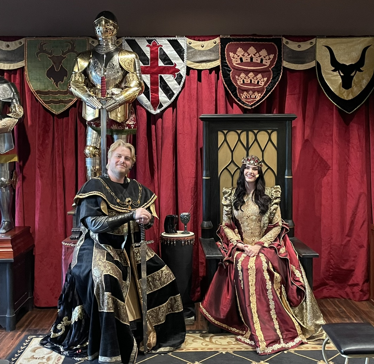 The queen and herald pose for a photo at Medieval Times in Buena Park, California