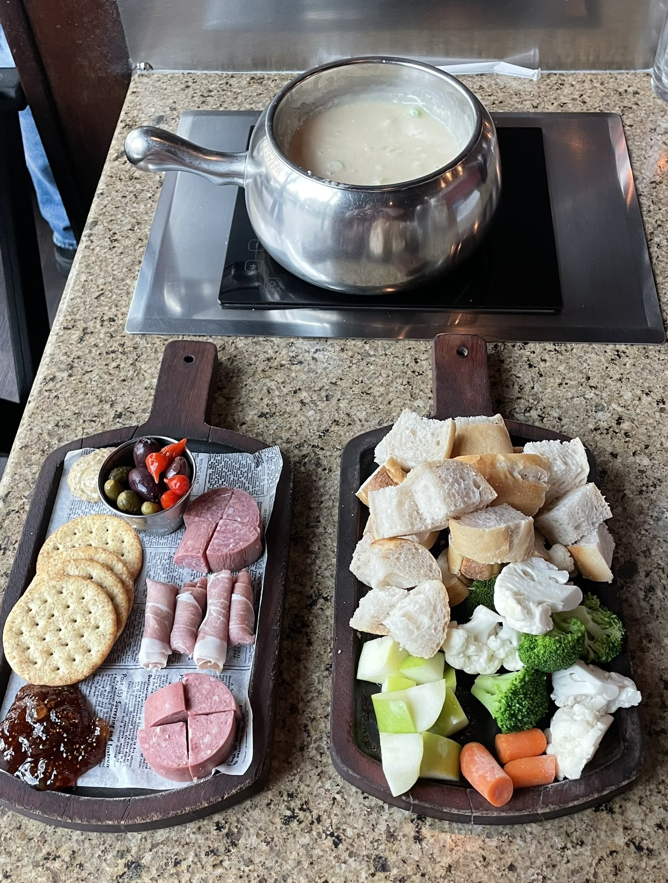 Cheese fondue, charcuterie, and cruditées at the Melting Pot