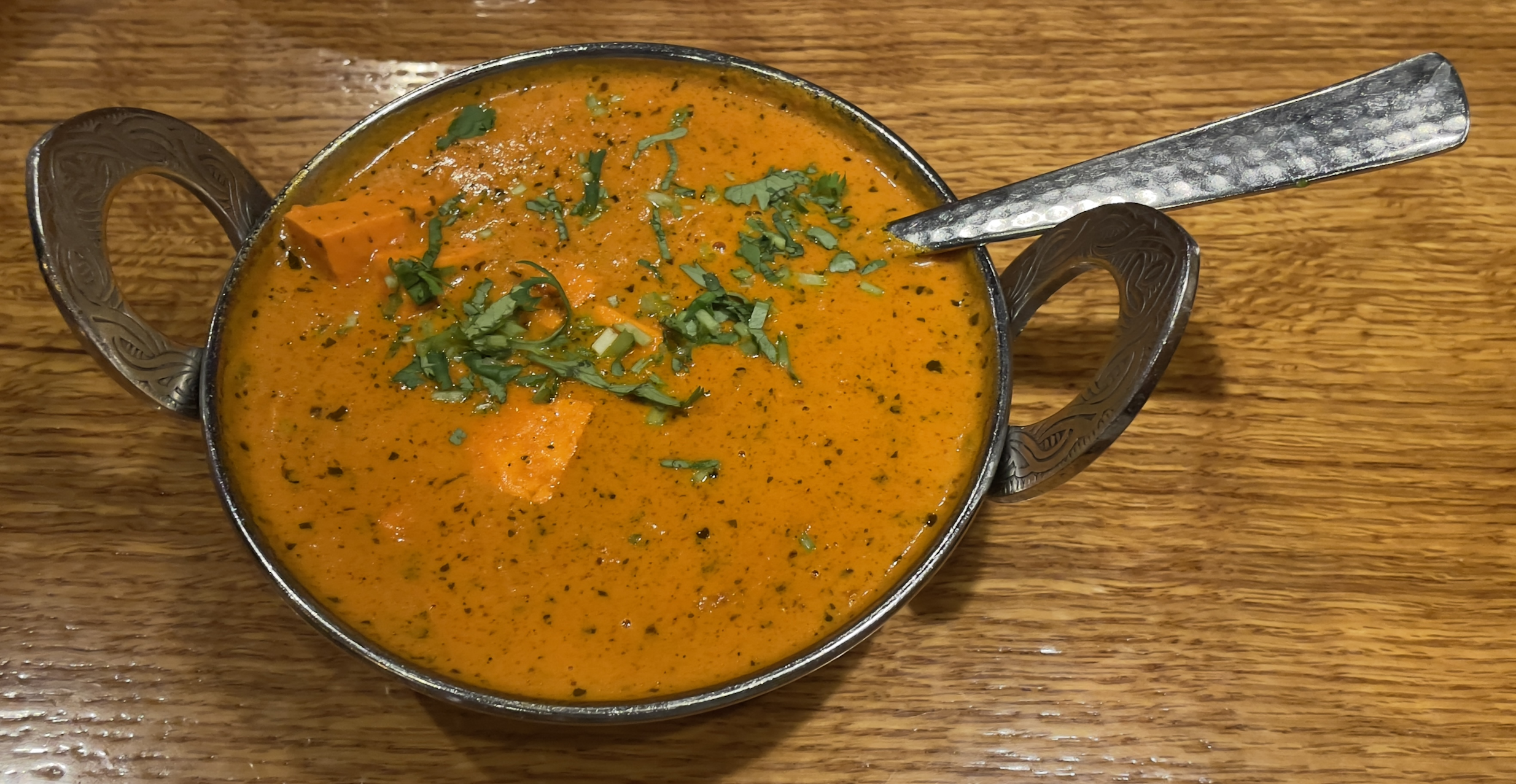 Paneer Masala at Mumbai House.  Homemade cheese cooked with bell pepper, onions, tomatoes, garlic, ginger, cream and spices.