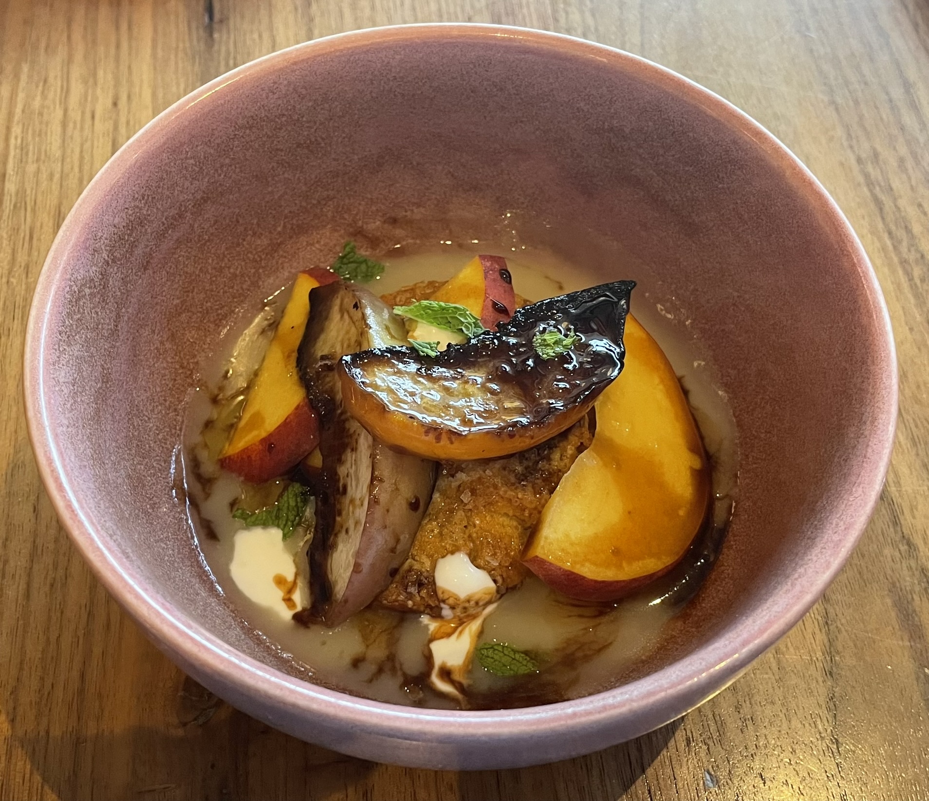 Savory Peaches & Cream at Oquirrh restaurant:  Seeded Biscuit, Grilled Peaches, Sour Cream, Parmesan Velouté, Aged Balsamic, Mint