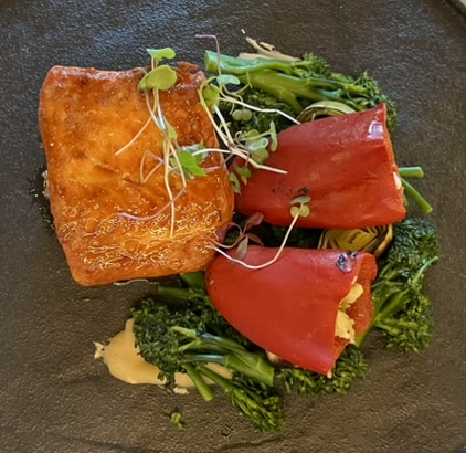 King Salmon at the Tree Room: Creole honey glaze, shrimp-stuffed piquillo pepper, white bean puree, broccolini.