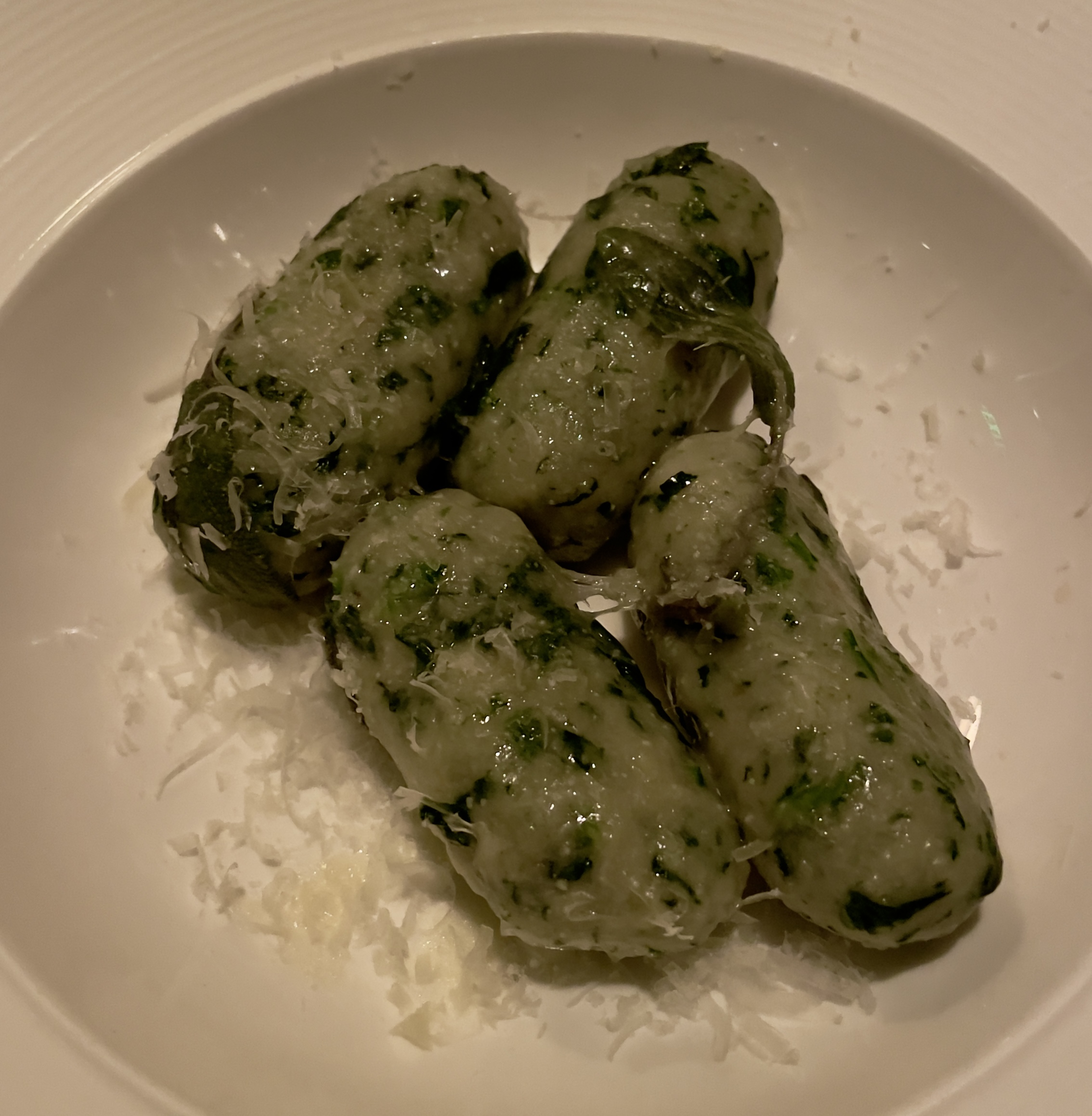 Strangola Preti (“Priest Choker”): spinach and bread dumplings with browned butter and aged Monte Veronese cheese at Veneto Ristorante Italiano.