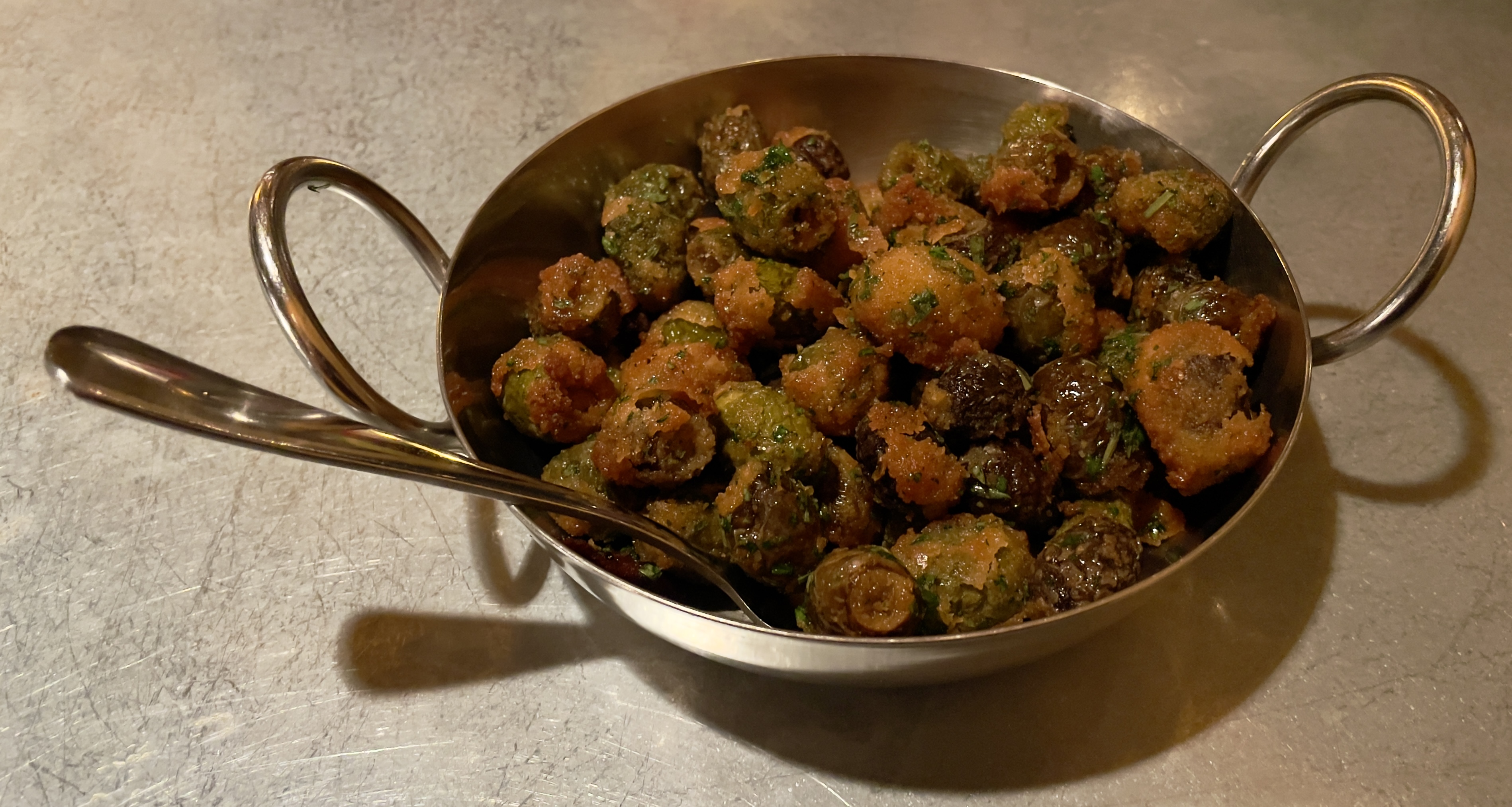 Fried olives with citrus oil and Maldon sea salt at Wildwood Restaurant.